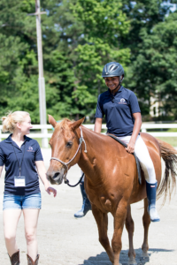 girl on horse with Leanne EOY 2017 celebration