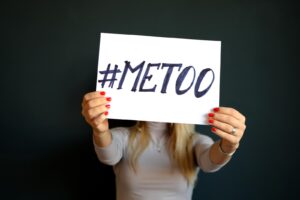 woman holding #metoo sign